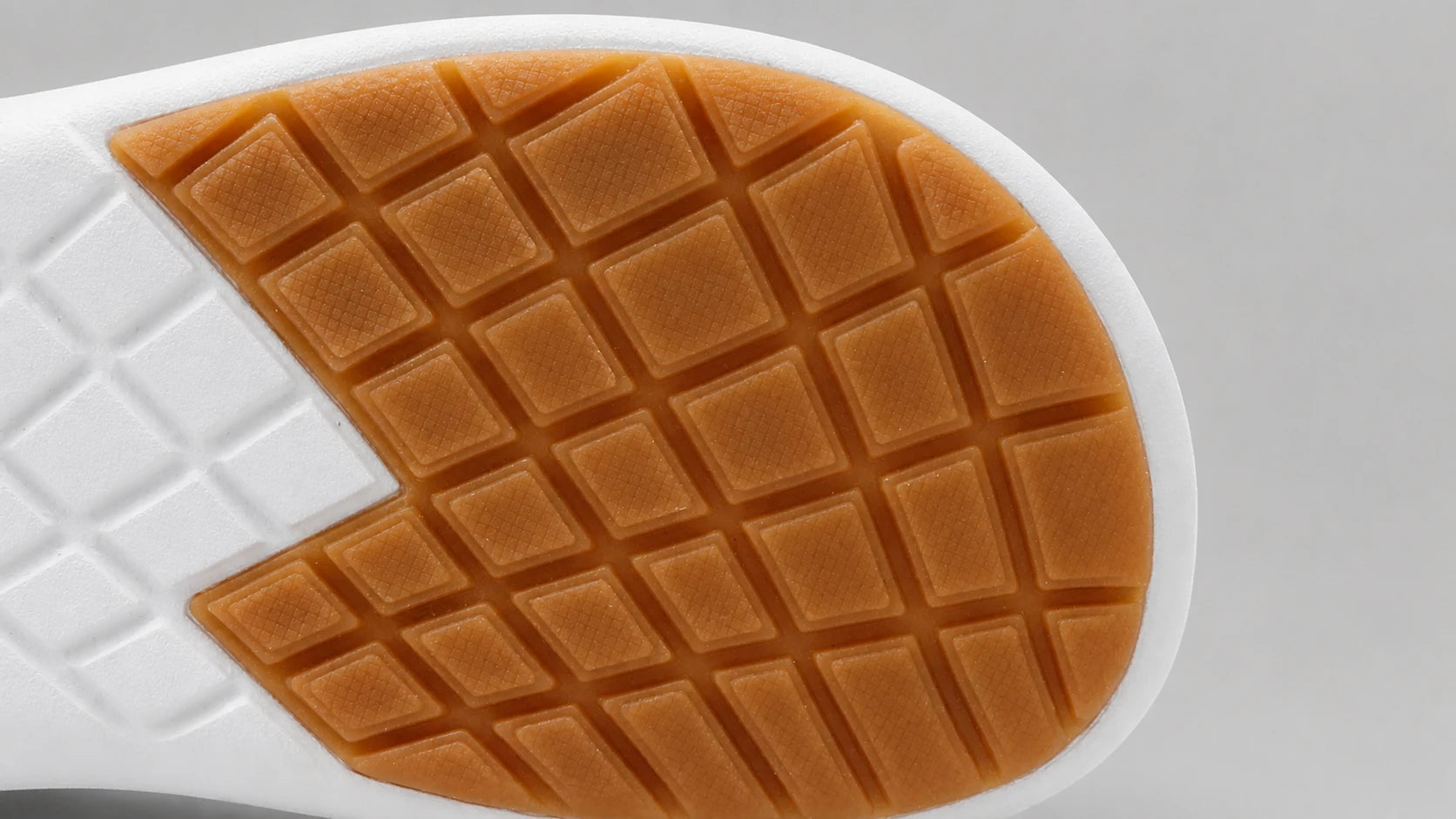 Orange rubber ground-contact zones on the Footle Water-Resistant outsole